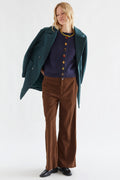 Compania Fantastica Navy Blue Jewel Button Knit Vest 64C/10289, styled with a teal coat and corduroy trousers