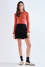 Compania Fantastica Rust Orange Frill Neck Knit Top 63C/10304, full length styled with a black cord mini skirt