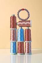 KKNEKKI Rosewood Seablue Glitter Stripe Multicolour Hair Tie 9318, styled with thread spools