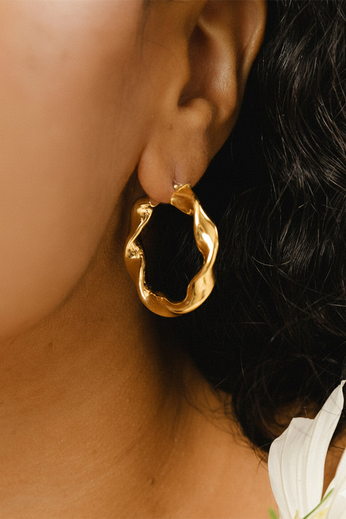 LBJ Jewellery Large Twist Gold Plated Hoops E123GP, worn
