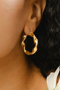LBJ Jewellery Large Twist Gold Plated Hoops E123GP, worn