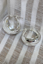 LBJ Jewellery Statement Domed Medium Silver Hoops E3708/1, styled on linen