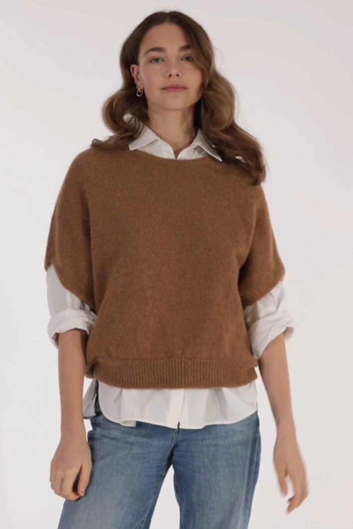 Les Racines du Ciel Aube Camel Natural Brown Sleeveless Jumper H26721, front view worn over a white shirt