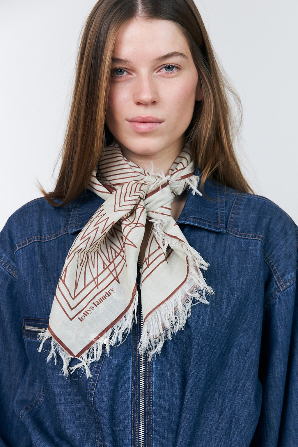 Lollys Laundry NoorLL Brown Print Fringed Scarf 70074-00046, knotted at the neck over a denim jacket