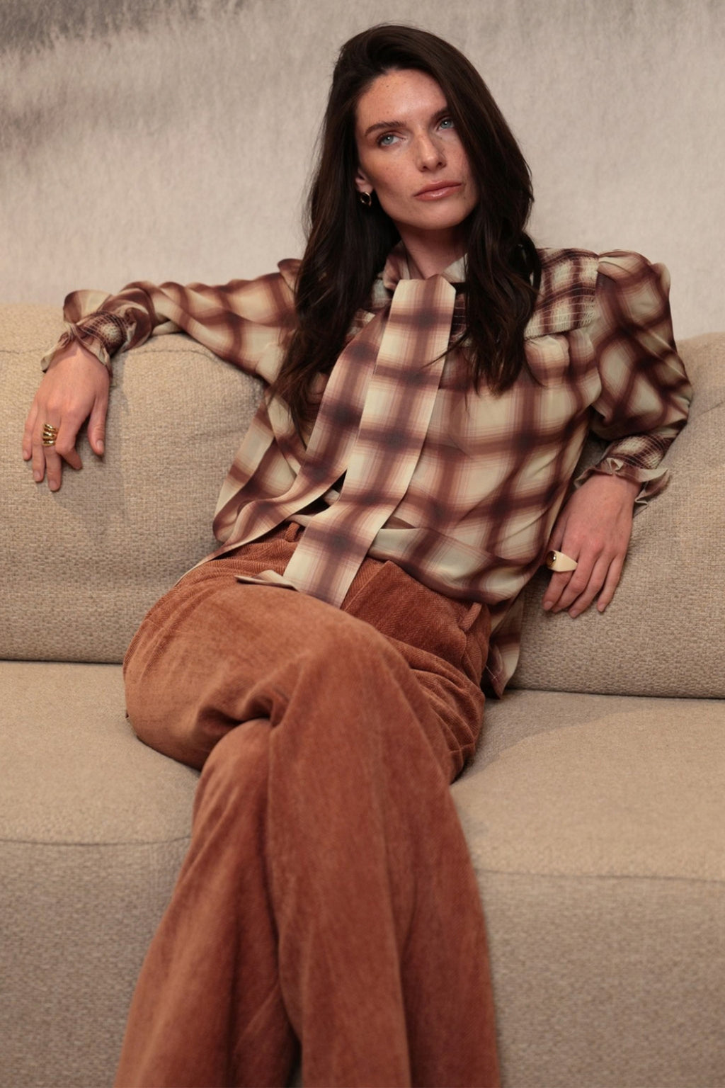Luna Llena Maeve Coral Orange Flared Trousers TR312, seated view with a checked shirt