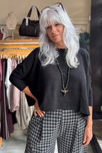 Mama B Rita Nero Black Jumper One Size, styled with check trousers