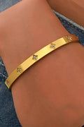 Misgraceful Clover Gold Bracelet Bangle, worn on wrist