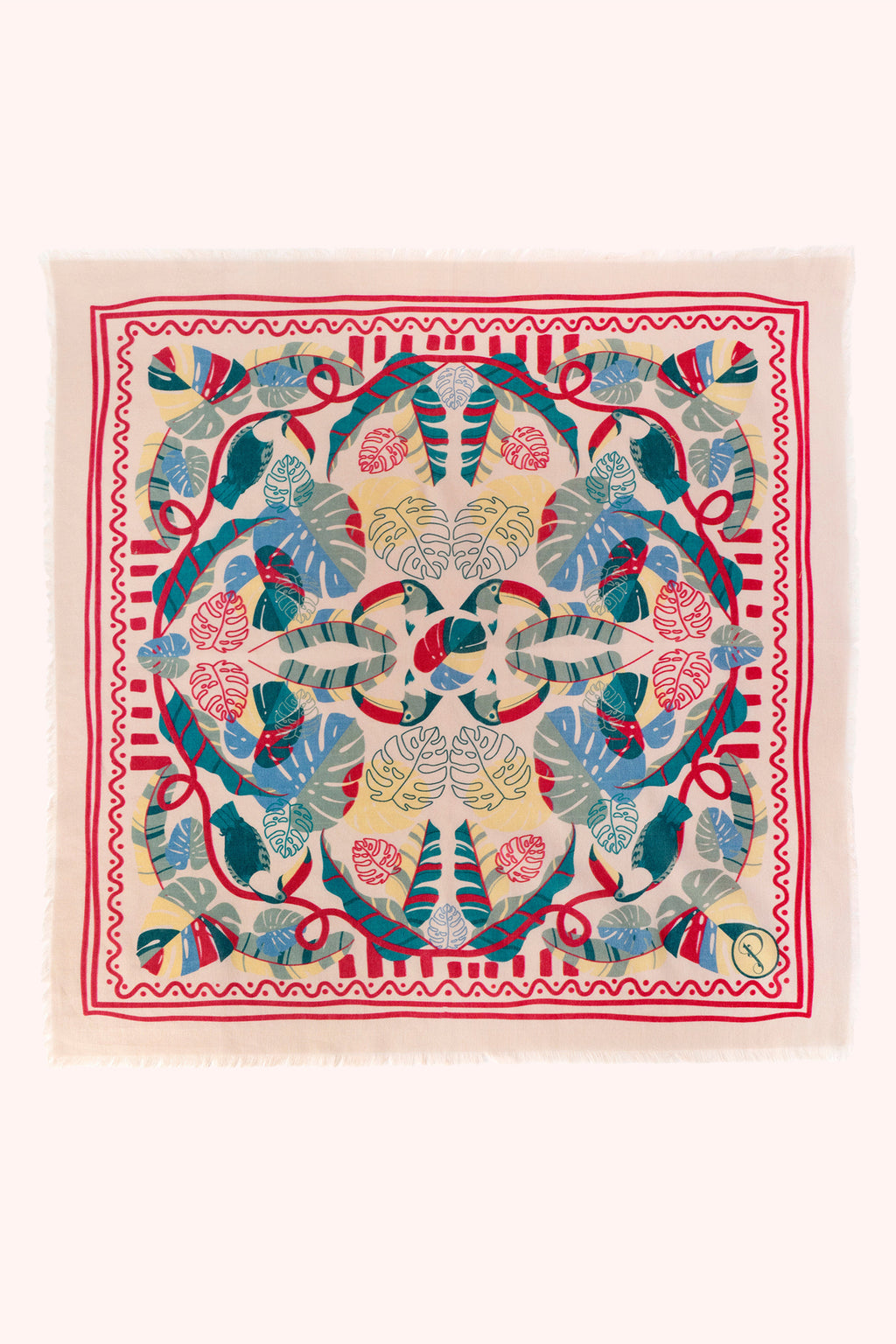 Colorful patterned fabric square with a central design on a white background