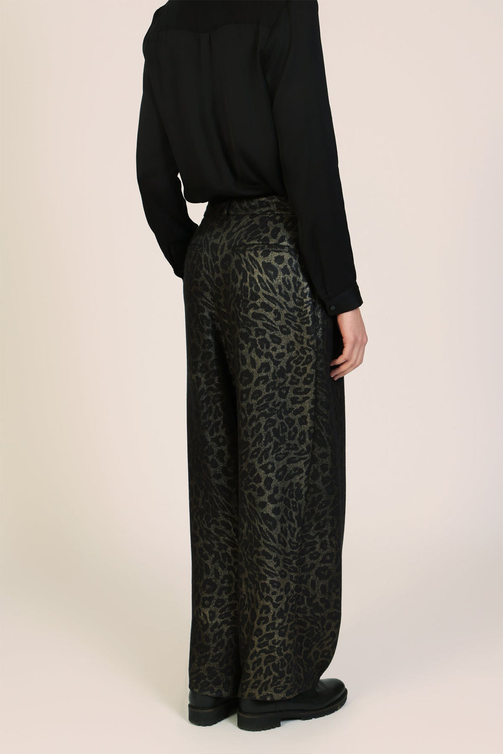 Traffic People Tallulah Black Leopard Print Wide Leg Trousers, side view on model