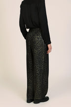 Traffic People Tallulah Black Leopard Print Wide Leg Trousers, side view on model