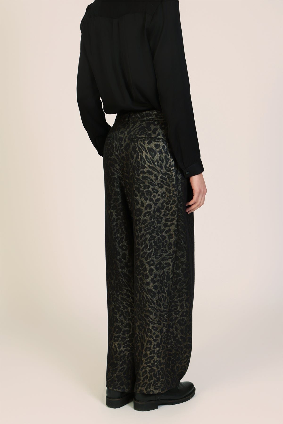 Traffic People Tallulah Black Leopard Print Wide Leg Trousers, side view on model