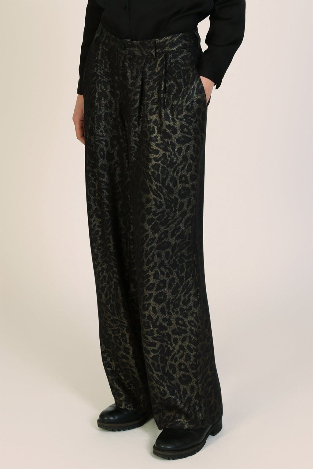 Traffic People Tallulah Black Leopard Print Wide Leg Trousers, close-up on model