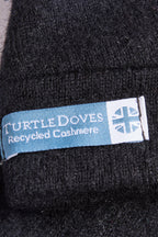 Turtle Doves Black Cashmere Fingerless Gloves, cuff label close-up