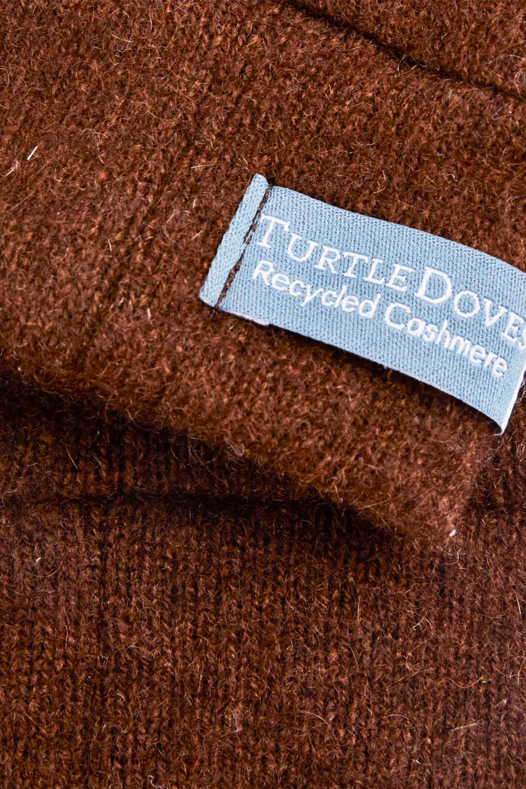 Turtle Doves Brown Cashmere Fingerless Gloves, cuff label close-up