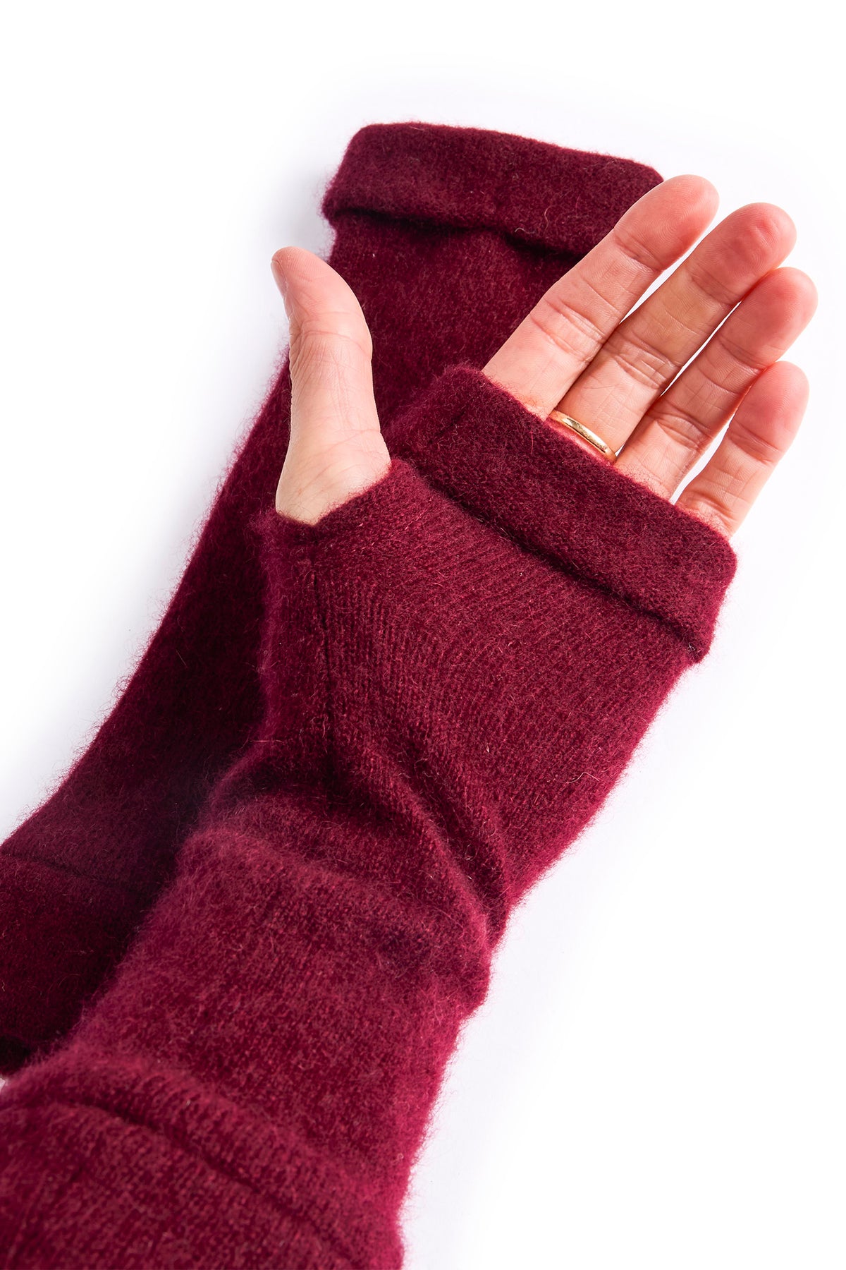 Turtle Doves Burgundy Red Cashmere Fingerless Gloves, worn on hands, palm view