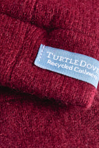 Turtle Doves Burgundy Red Cashmere Fingerless Gloves, cuff label close-up