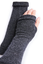 Turtle Doves Charcoal Grey Cashmere Fingerless Gloves, worn on hands, side view