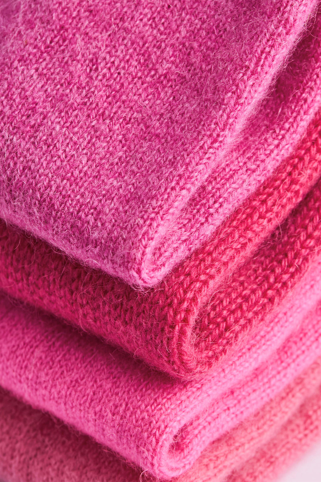 Turtle Doves Cherry Blossom Pink Cashmere Fingerless Gloves, folded stack