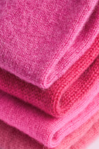 Turtle Doves Cherry Blossom Pink Cashmere Fingerless Gloves, folded stack