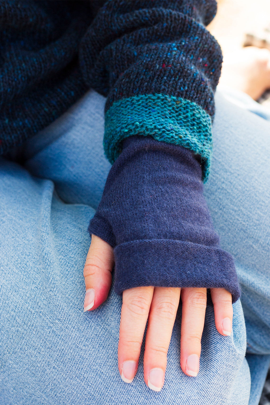 Turtle Doves Denim Blue Cashmere Fingerless Gloves, worn with jeans, back of hand