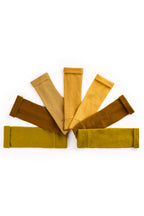 Turtle Doves Mustard Yellow Cashmere Fingerless Gloves, flat lay