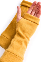 Turtle Doves Mustard Yellow Cashmere Fingerless Gloves, worn on hands, palm view