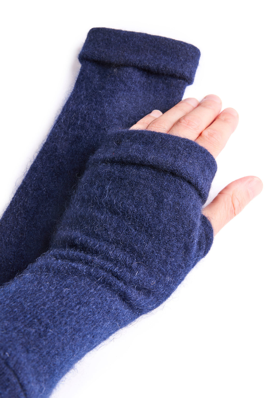 Turtle Doves Navy Cashmere Fingerless Gloves, worn on hands, side view