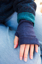 Turtle Doves Navy Cashmere Fingerless Gloves, worn with jeans, back of hand