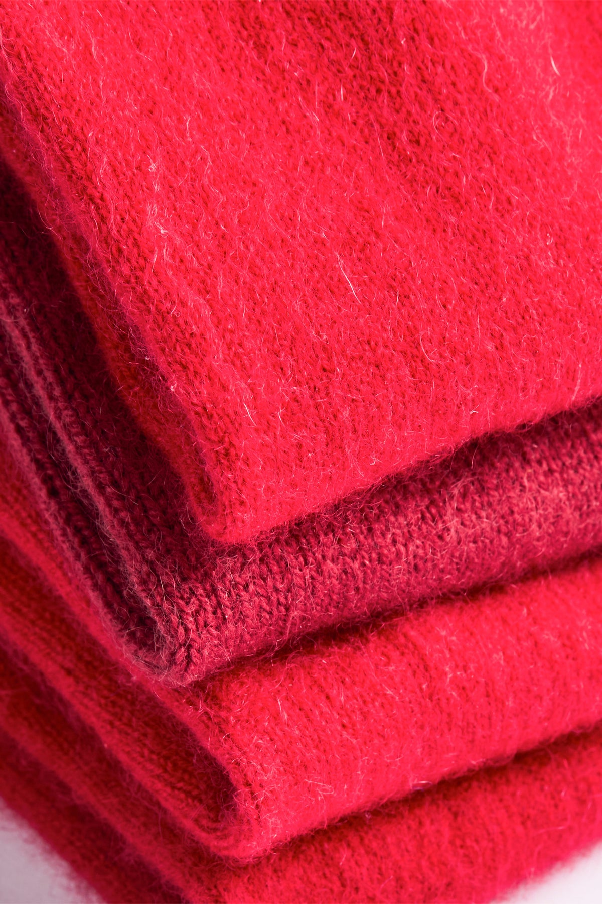 Turtle Doves Red Cashmere Fingerless Gloves, folded stack