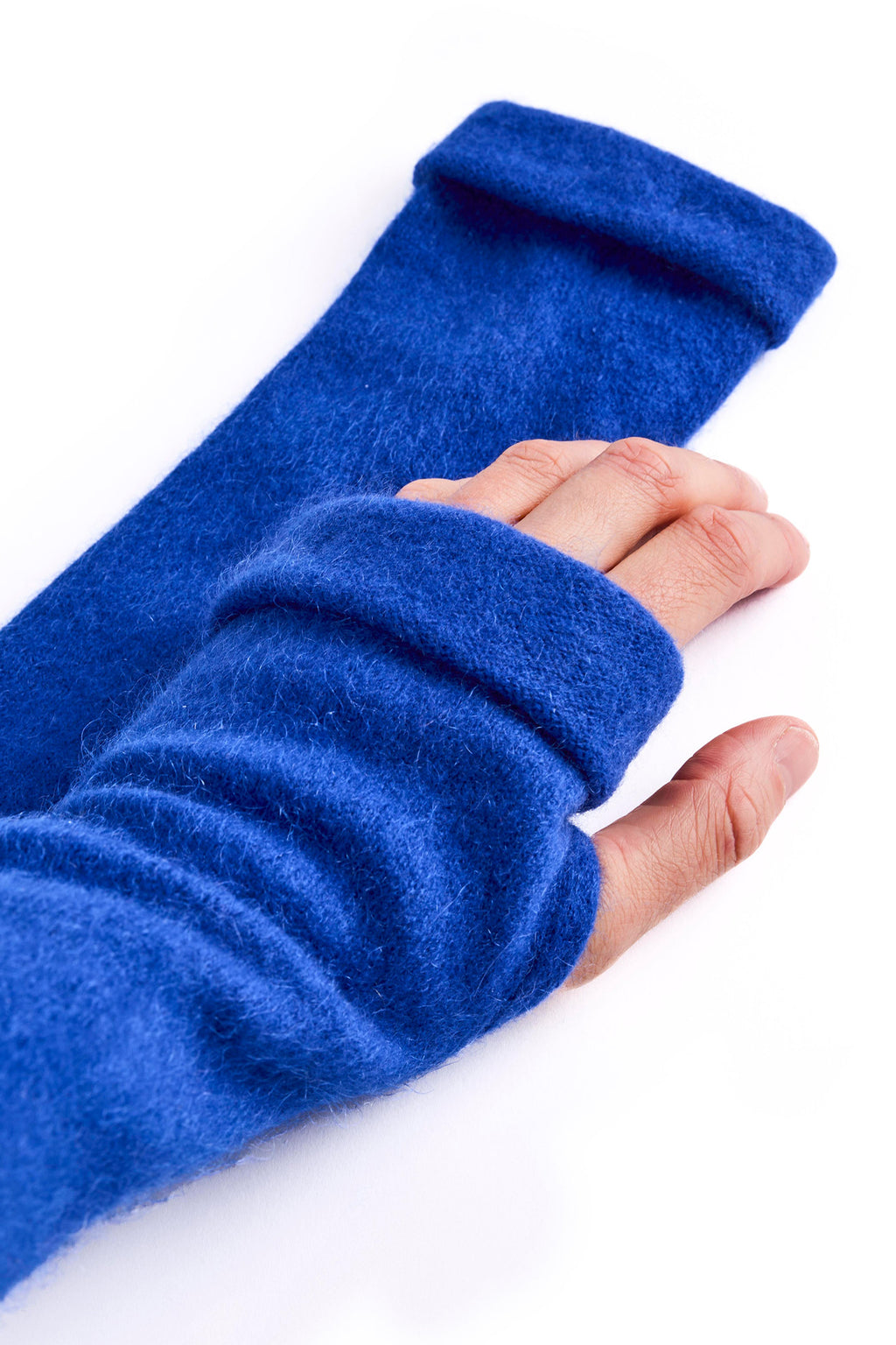 Turtle Doves Royal Blue Cashmere Fingerless Gloves, worn on hands, side view