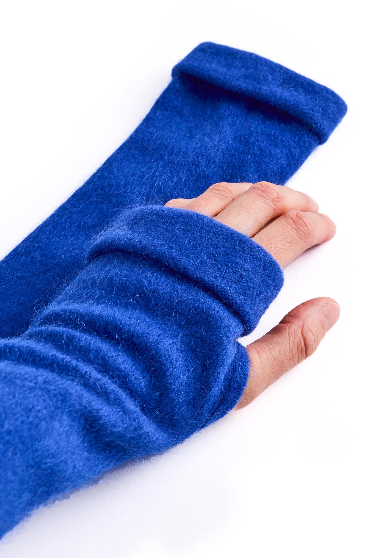 Turtle Doves Royal Blue Cashmere Fingerless Gloves, worn on hands, side view