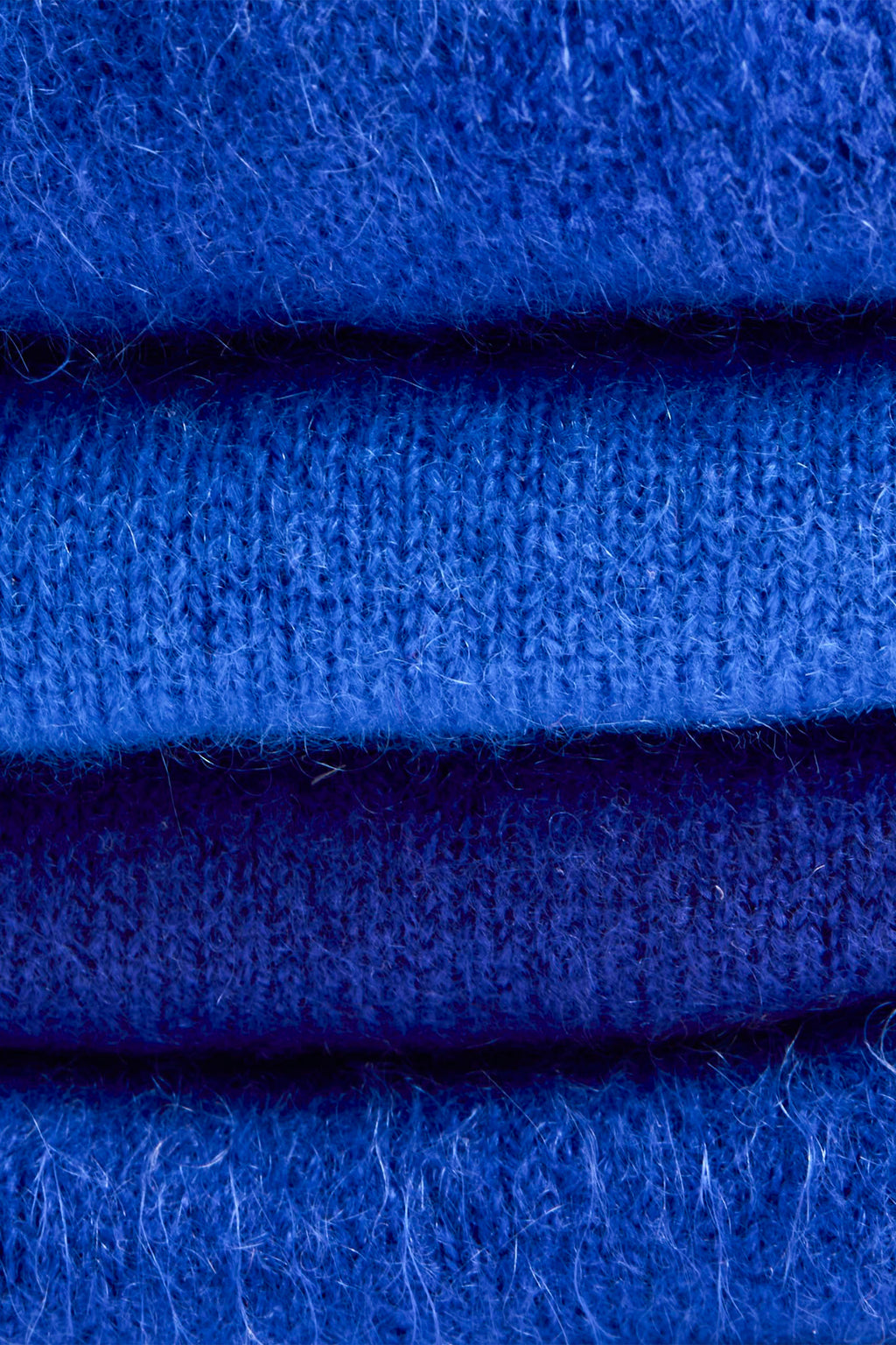 Turtle Doves Royal Blue Cashmere Fingerless Gloves, folded stack