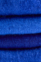 Turtle Doves Royal Blue Cashmere Fingerless Gloves, folded stack