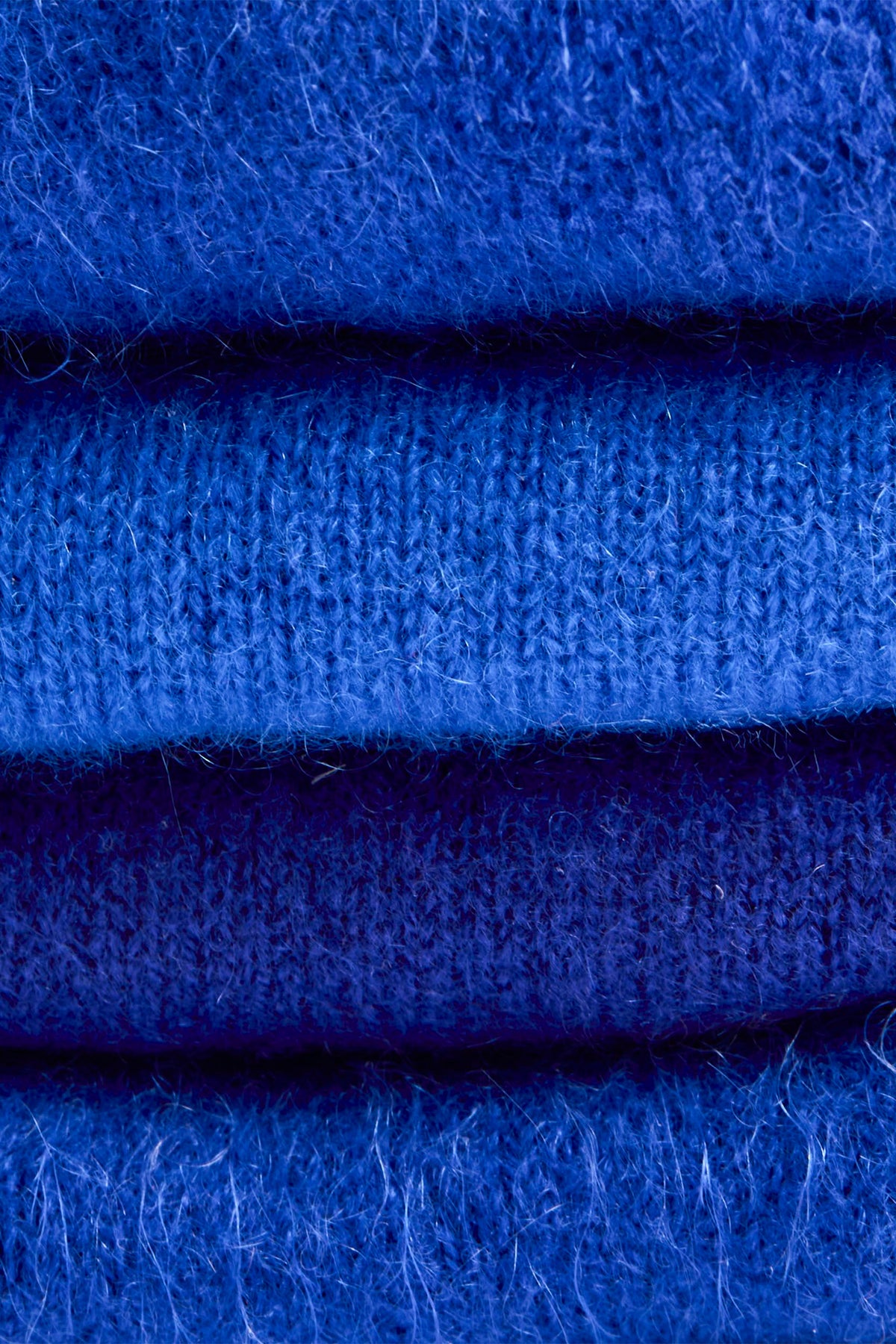Turtle Doves Royal Blue Cashmere Fingerless Gloves, folded stack