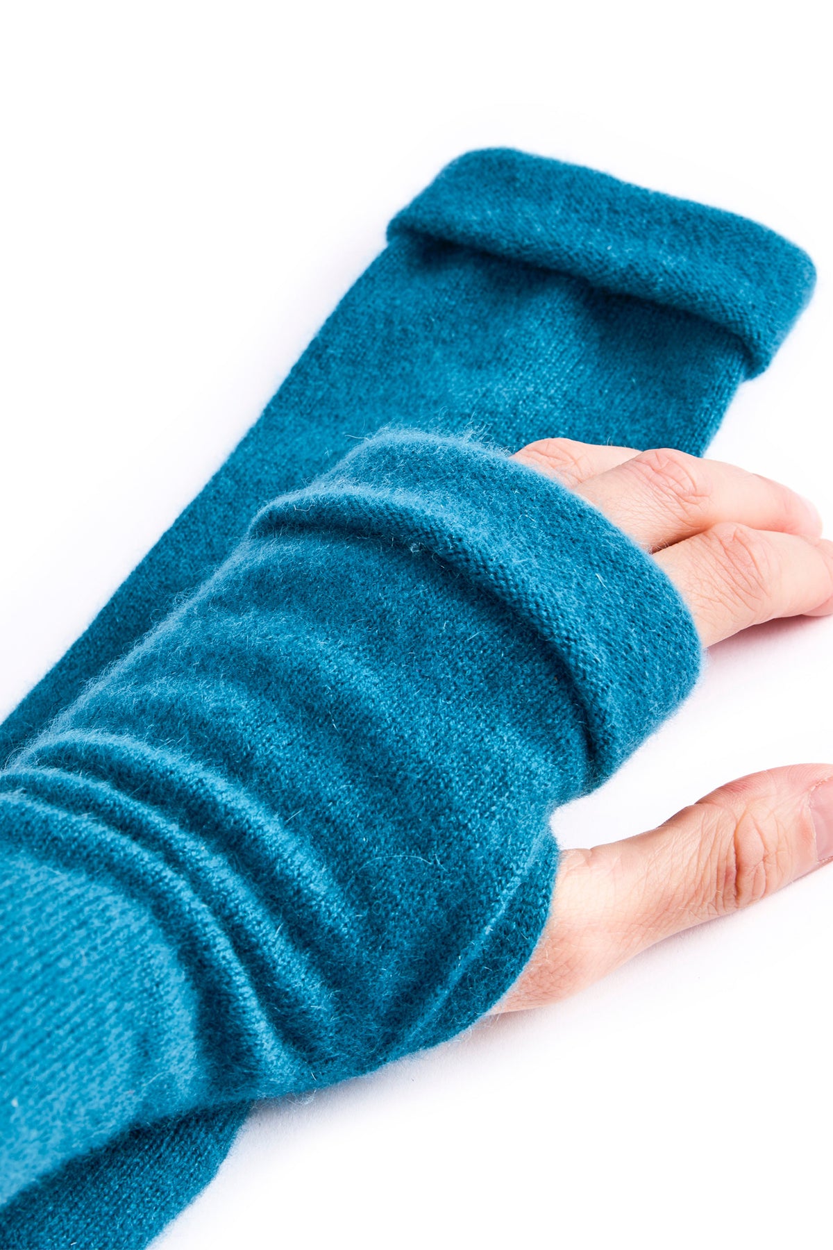 Turtle Doves Teal Blue Cashmere Fingerless Gloves, worn on hands, side view