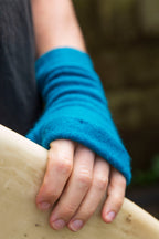 Turtle Doves Teal Blue Cashmere Fingerless Gloves, worn on hand, back of hand close-up