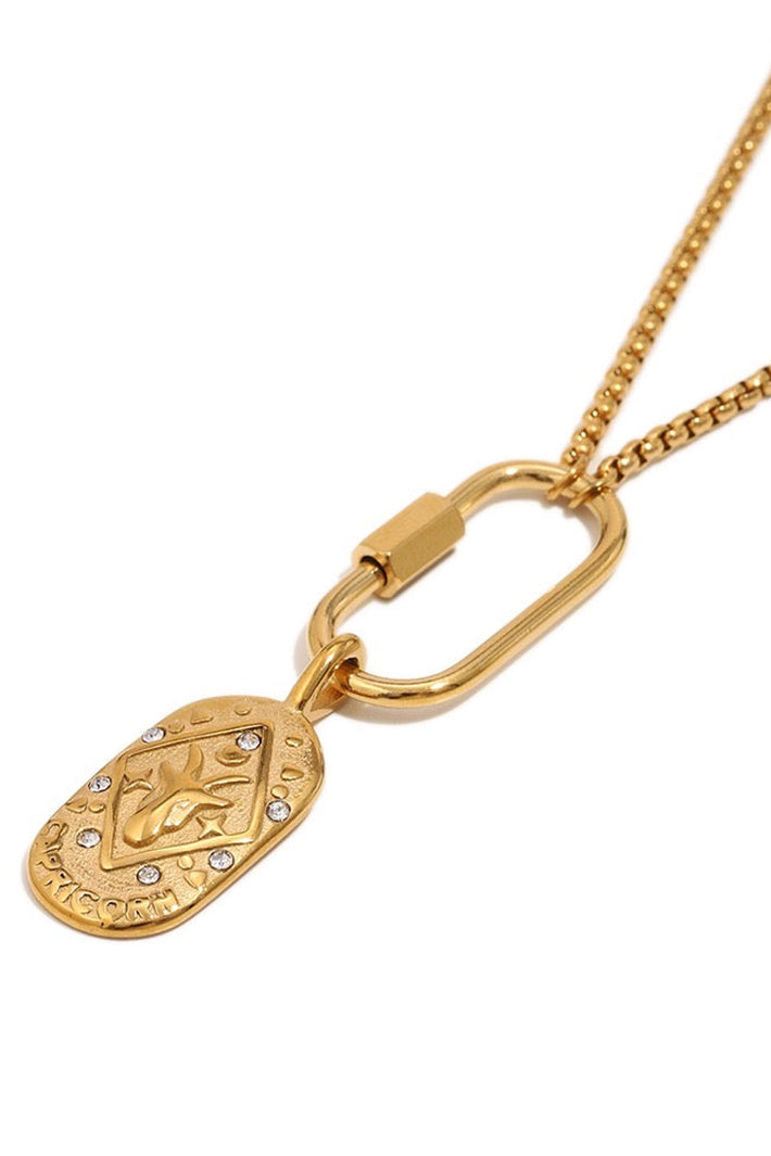 Wild Spirit Capricorn Horoscope Gold Charm Necklace, angled view