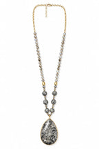 Wild Spirit Larvikite Grey Glow Necklace, flat lay with pendant detail
