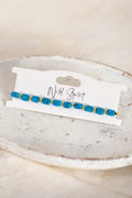 Wild Spirit The Blue Nomad Bracelet, flat lay on branded card