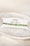 Wild Spirit The Green Jade Nomad Bracelet, flat lay on branded card