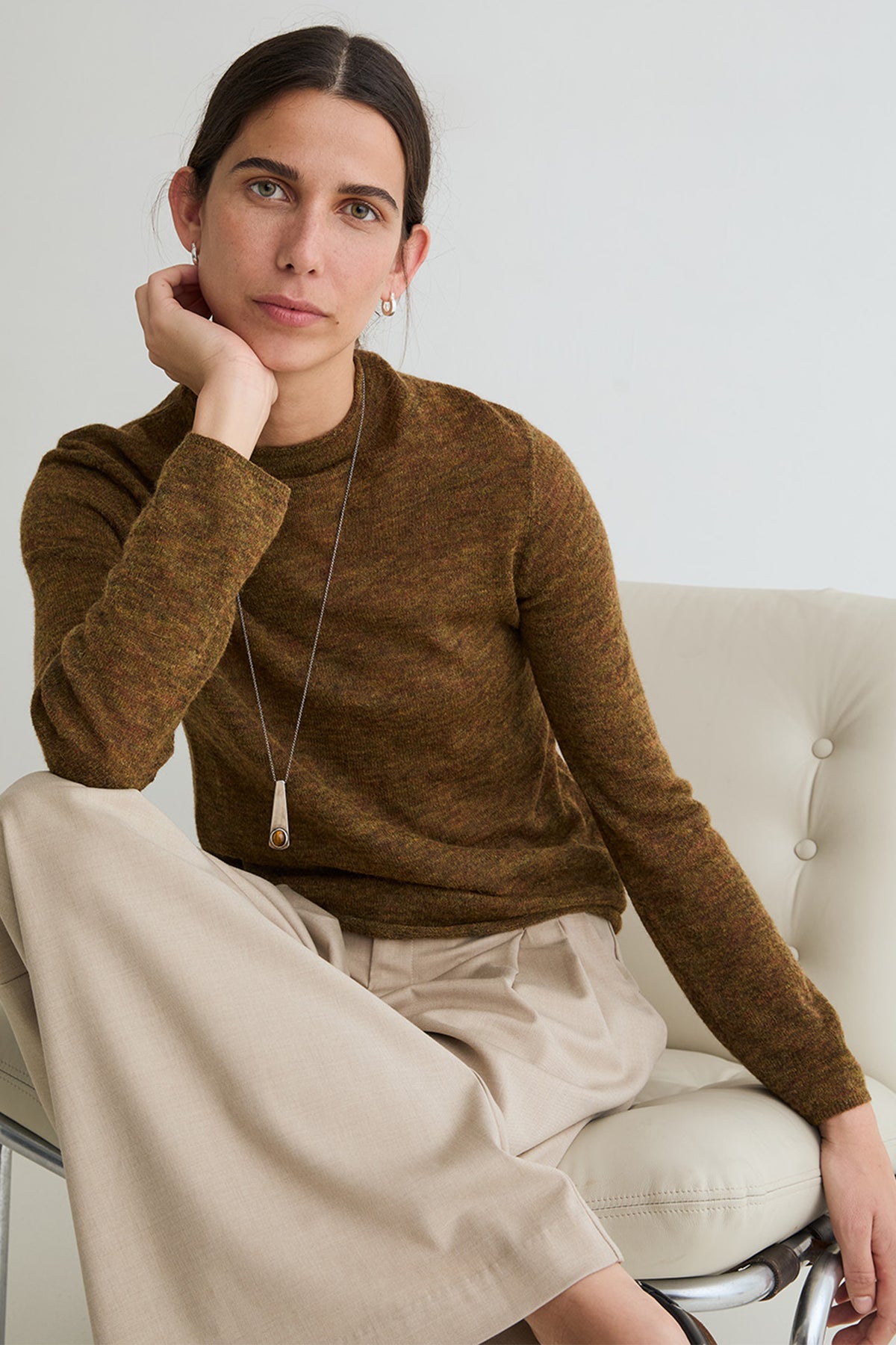 Yerse Meri Khaki Green Funnel Neck Jumper 45545, seated styled view